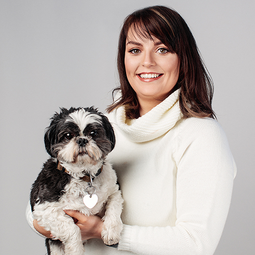 Stefanie O'Donnell holding her dog